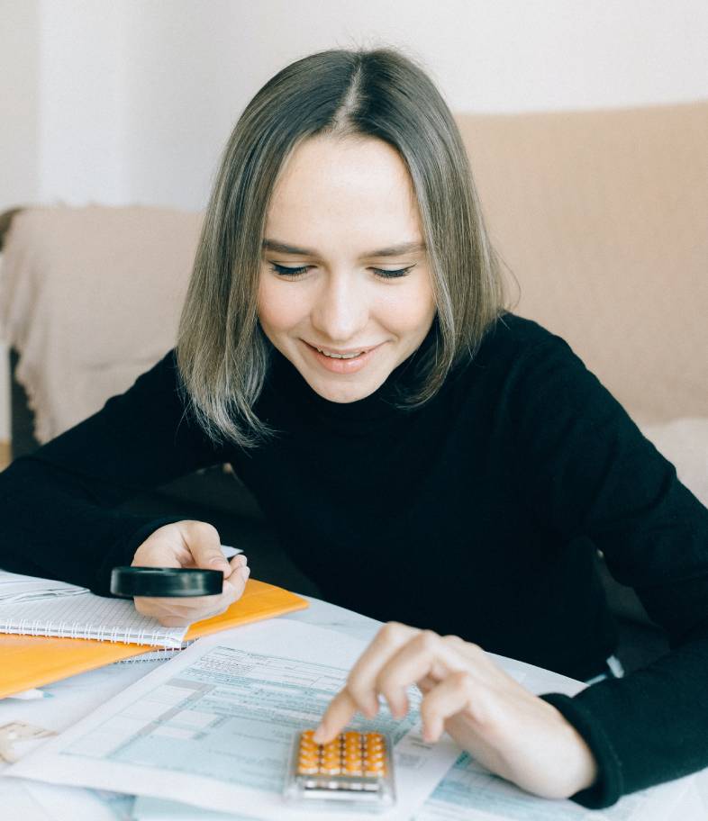 A woman working on tax planning