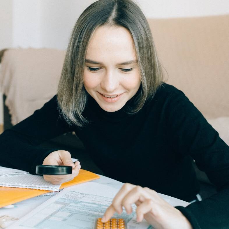A woman working on tax planning